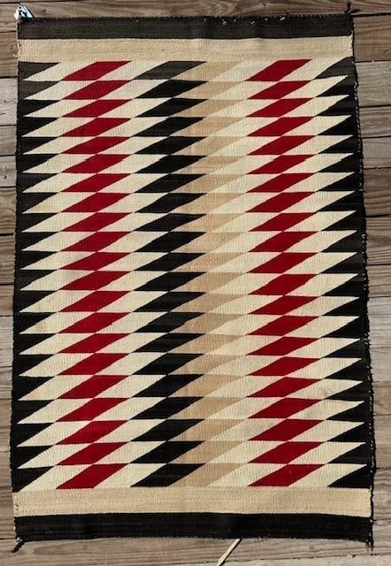 Navajo Hand-Woven Rug - Eye Dazzler: Native American Navajo hand-woven rug. Dazzler pattern. Measures 58"x36". Some vintage wear.