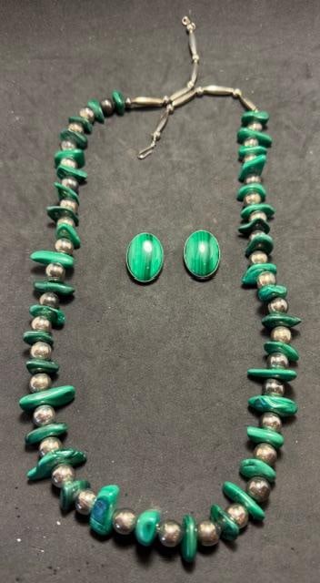 Native American Navajo Sterling and Malachite Jewelry Set: Native American Navajo sterling and malachite earrings and necklace set. Earrings are clip on. Marked sterling and signed MA. Necklace measures 29". Earrings measure .75" x 1". Lovely.