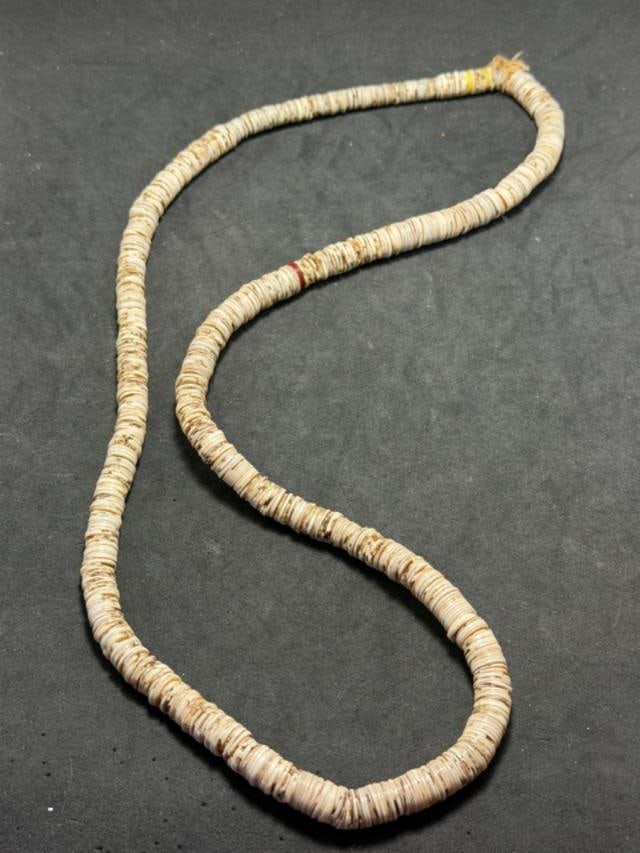 Native American Heishi Shell Necklace: Heishi shell necklace. Strung on string and measures 28".