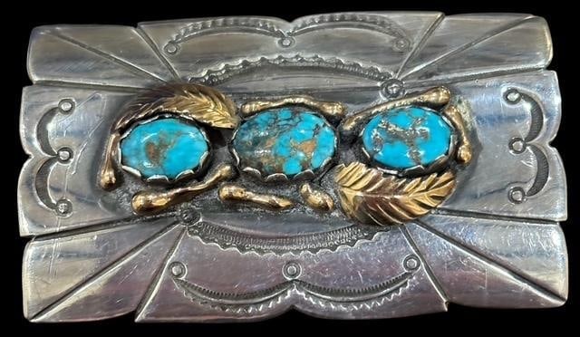 Native American Navajo Signed Carl Luthy 14K, Turquoise and Sterling Belt Buckle: Native American sterling, turquoise and 14K yellow gold belt buckle. Marked sterling with the Carl Luthy hallmark shop icon and the numerals 2805. Measures 2.5" x 1.5".