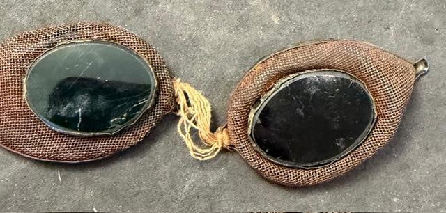 Civil War Artillery Goggles: Civil War artillery goggles. Mesh frame with oval green lenses. Measure 5"x 1.5".