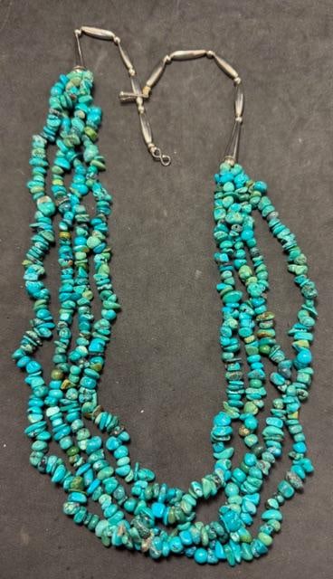 Sterling and Turquoise Multi Strand Necklace: Sterling and turquoise nugget triple strand necklace. Sterling spacers on each end. Wire strung. Lovely piece.