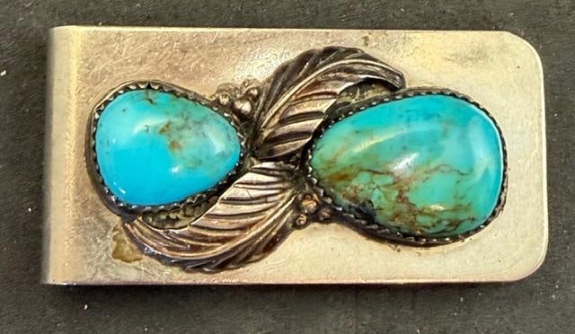 Native American Navajo Stainless and Sterling Money Clip: Native American Navajo stainless and sterling money clip. Stainless steel clip with sterling and turquoise face. Measures 1" x 2".