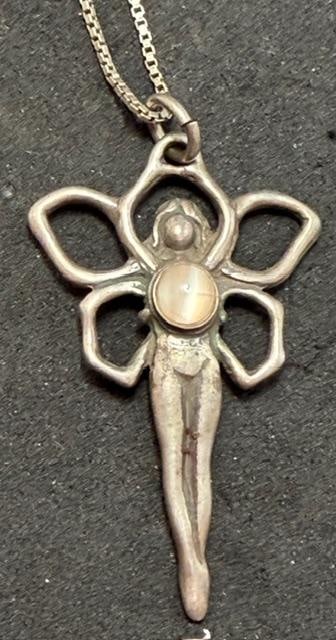 Sterling Italian Pendant Fairy Necklace Signed VMA: Sterling Italian pendant necklace. Fairy pendant marked .925 and signed VMA and features a pink opaque center stone. Chain measures 24". Total weight 5.5g. Pendant measures 1" x 1.25".