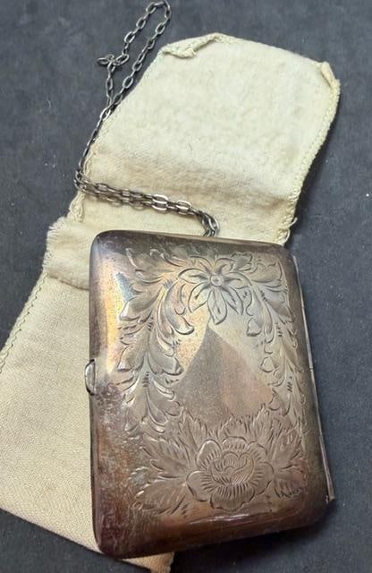 Antique Ladies' Sterling Compact/Change Purse Ca. 1920s: Ladies' sterling compact/change purse. Marked sterling. Measures 2" x 2.5" and weighs 49g. Popular item from the 1920's.