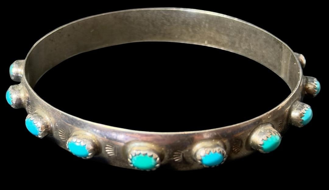 Native American Navajo Signed LB Sterling and Turquoise Bracelet: Native American Navajo sterling and turquoise bracelet. Marked sterling and signed LB. Total weight 28g. Circumference measures 7".