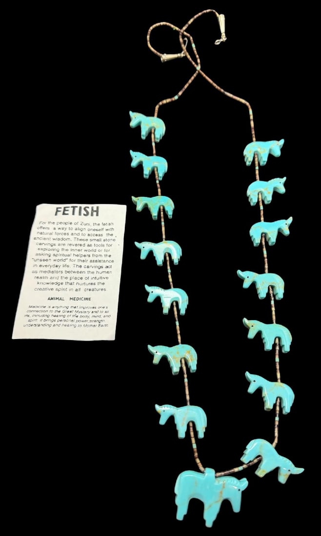 Native American Zuni Turqouise Horse Fetish Pendant Necklace: Native American Zuni pendant necklace. Hand carved horse fetish pendant measures 1.25" x 1". Small side hand carved horses measure 1" x .75". each. Necklace measures 31" and is presented in a Birks fe