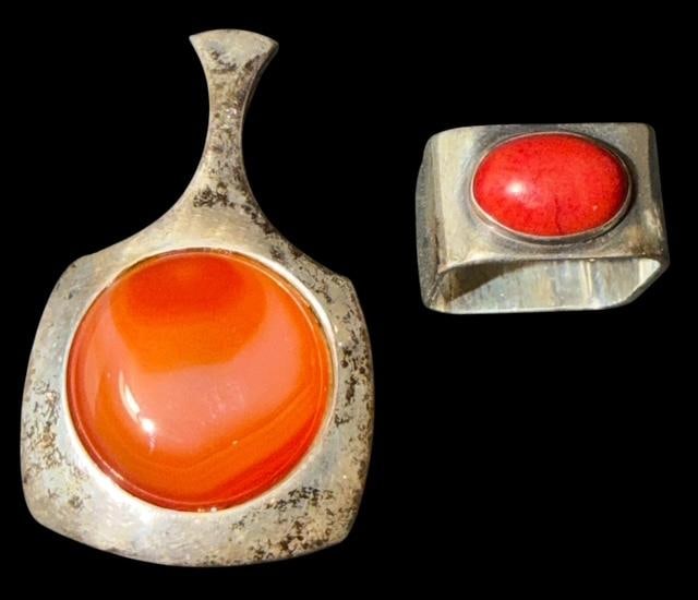 Sterling and Carnelian Agate Stone Ring Signed JS and Pendant: Sterling and carnelian agate stone square ring and pendant. Marked .925 and signed JS. Pendant measures 1.25" x 2". Ring has a .75" square stone and is a size 8.5. Total weight 40g.