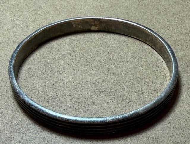 Taxco Mexico Sterling Bracelet: Taxco Mexico sterling bracelet. Weighs 32 g. 7" inside circumference, 2.5" diameter.