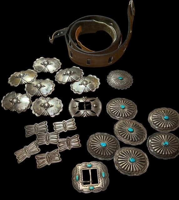 Early Pawn Sterling and Leather Concho Belts: Early pawn sterling and leather concho belts. 1) Buckle marked .925 and signed Dear (David Dear - Santa Fe area Navajo silversmith). Seven conchos measure 2.75" x 2" and weigh 343 g. Buckle weighs 41g