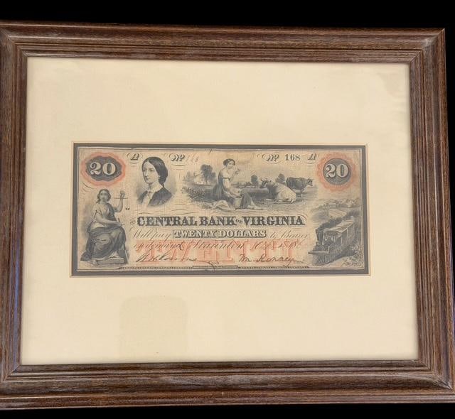 1860's Framed Virginia Currency with COA Civil War era: Framed Virginia $20 currency bill from 1860's. Includes COA from Antiquities Certificate of Authenticity #59629-FX 168A. Frame measures 11" x 9" x 1". Stanton VA.