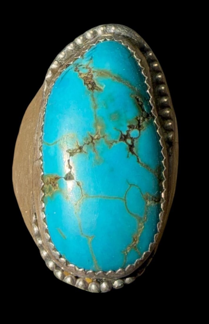 Navajo Sterling and Turquoise Men's Ring Size 10 Hallmark Signed: Sterling (tested) and turquoise stone ring. Hallmark signed. Stone measures .5" x 1". Size 10. Total weight of ring is 21g.