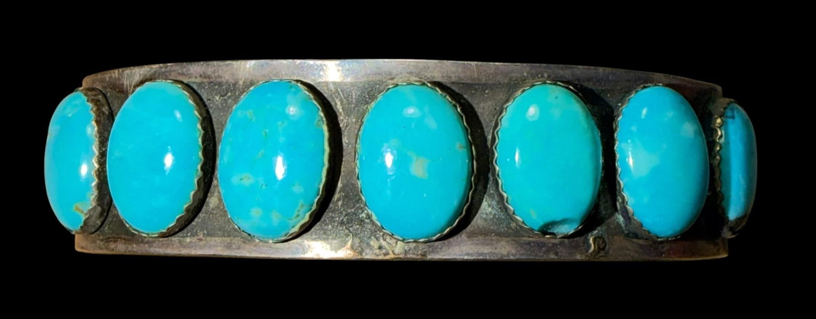Native American Navajo Sterling and Turquoise Cuff Bracelet: Native American Navajo sterling (tested) and turquoise cuff bracelet. Total weight 39g. Cuff width is .75". Circumference measures 7" with a 1.75" cuff opening.