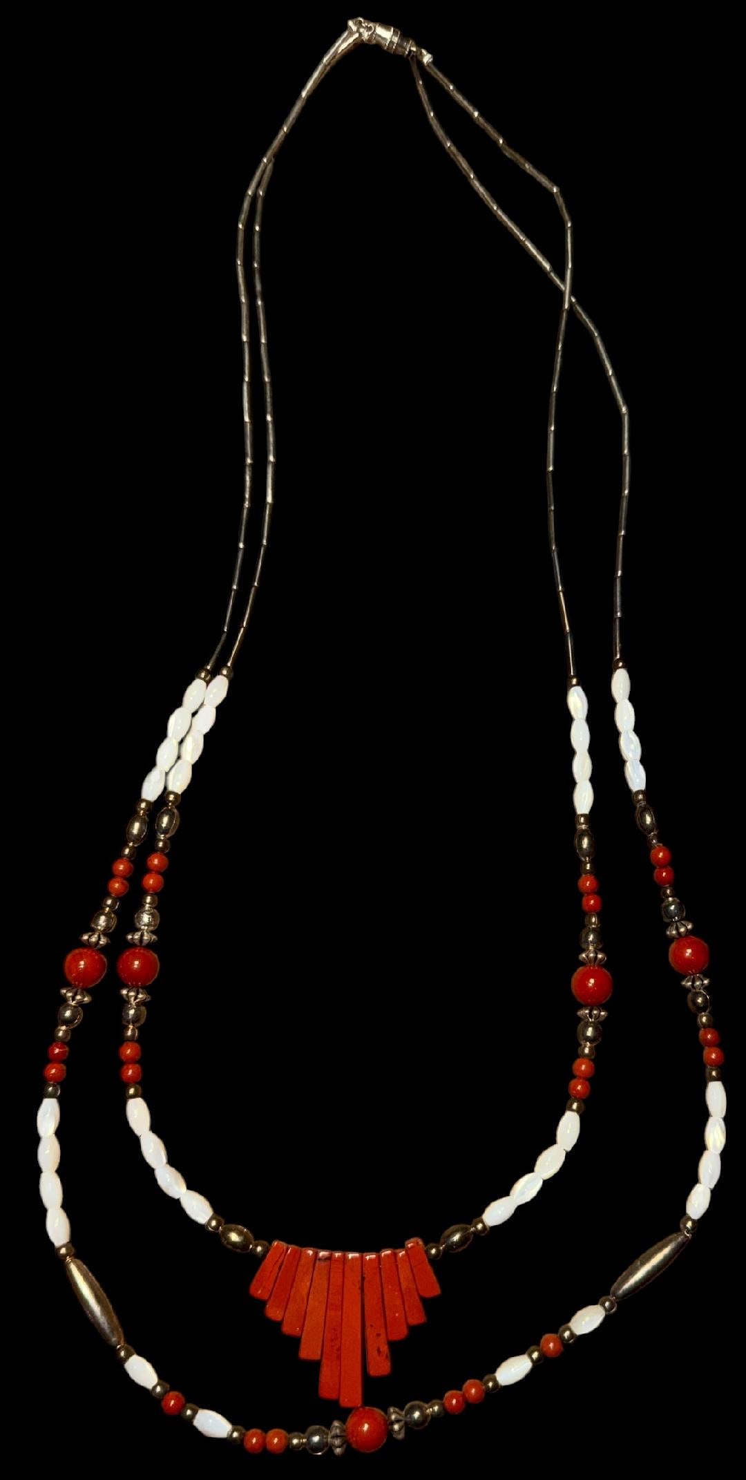 Native American Liquid Silver and Carnelian Stone Necklace: Native American double strand liquid silver and carnelian stone bead necklace. Lovely design. Measures 25".