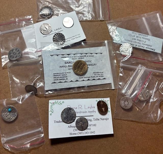 Lot of Signed Navajo Sterling Button Covers: Lot of thirteen signed Navajo sterling button covers faces. Could be used as tie tacks also. Measure .5" x .75".
