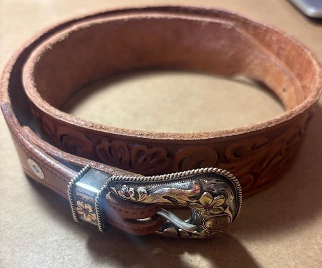 Hollywood Vintage Bohlin Ladies' Sterling and 18K Gold Belt and Buckle with Rubies: Vintage ladies' sterling and 18k gold belt and belt buckle. Monogrammed T with small rubies. Made by Edward Bohlin, Hollywood California. Ranger set Buckle measures 1.75" x 1.75". Belt is 36" long