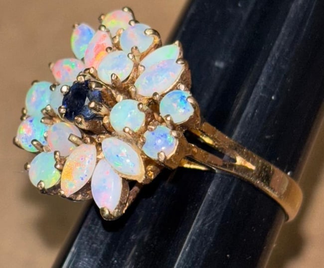 14K Gold and Opal Cluster Ring with Center Sapphire: 14k gold and opal cluster ring with center sapphire. Approximately .75" long, Weighs 5.6g and size 7.