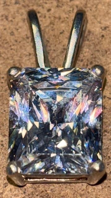 Sterling Pendant with CZ Stone: Sterling pendant with CZ stone. Measures .5" x .75".