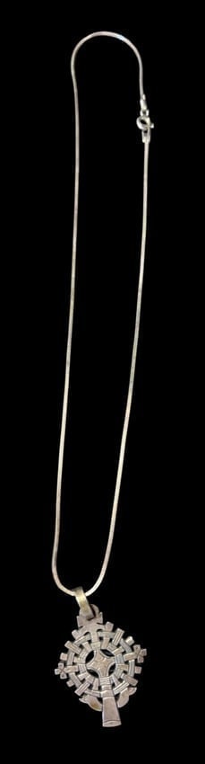 Ethiopian Cross Pendant on Sterling Chain: Ethiopian Cross pendant 1"x1.5" base metal on 16" sterling chain.