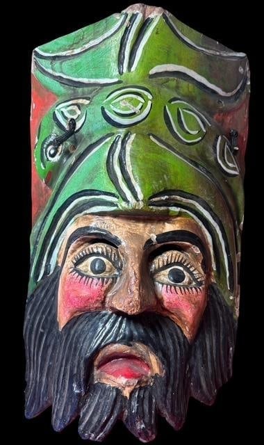 Vintage Mexican Hand Carved and Painted Wooden Mask: Unique Mexican mask, carved from single piece. Traditional paint colors. Measures 7.5" x 12.5".