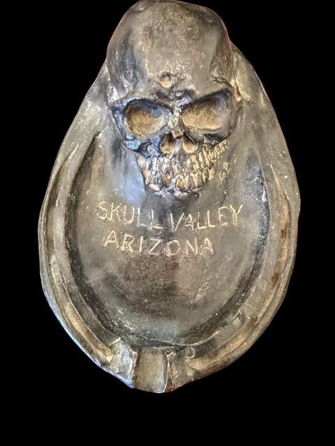 Skull Valley Arizona Cast Ashtray George Phippen Cowboy Artist of America: Skull Valley Arizona cast ashtray. Attributed to George Phippen, Cowboy arts of American western artist. Very rare. Unsigned, however consigner put information ID on bottom. See photos. Measures 6.5" 