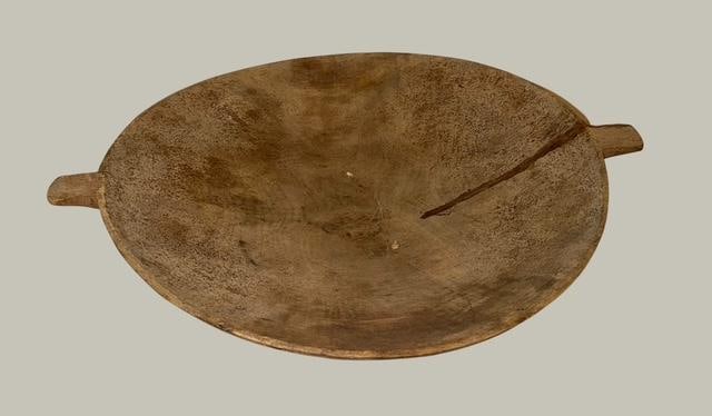 Antique Handcarved Wood Dough Bowl: Antique hand-carved wooden dough bowl. Carved from a single piece of wood. Signed on the bottom with an "A+". Measures 22" x 18" x 4". Primitive artifact.