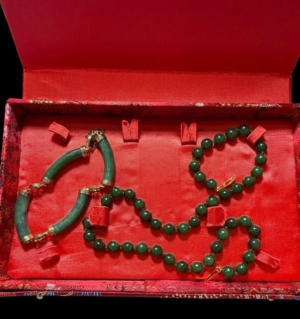 Jade Dynasty Collection Necklace and Bracelet Set: Jade Dynasty Collection necklace and bracelet set in box. Necklace measures 17" and his made up of .25" jade beads. Bracelet consists of four section and opens to make easy on and off. Measures 2.5" a