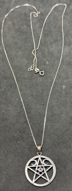 Sterling Wiccan Pentagram Pendant Necklace: Sterling wiccan pendant necklace. Pendant and chain both marked .925. Pendant measures 1" a cross with a purple center stone. Total weight 7.5g. Chain measures 24".