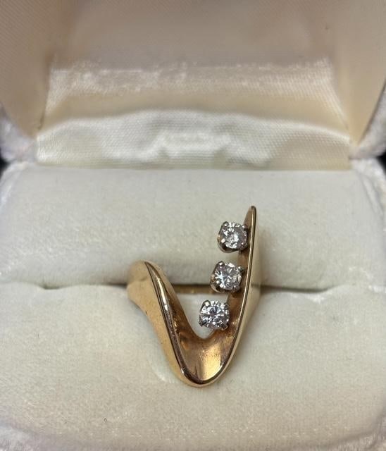 14K Gold Freeform Style Ring with Three Diamonds: 14k yellow gold freeform style ring with three diamonds, .18ct, .17ct, .17ct. Total diamond weight .52ct. Total weight 5.9 grams. Size 5.5 with two sizing beads. Includes jeweler's appraisal.