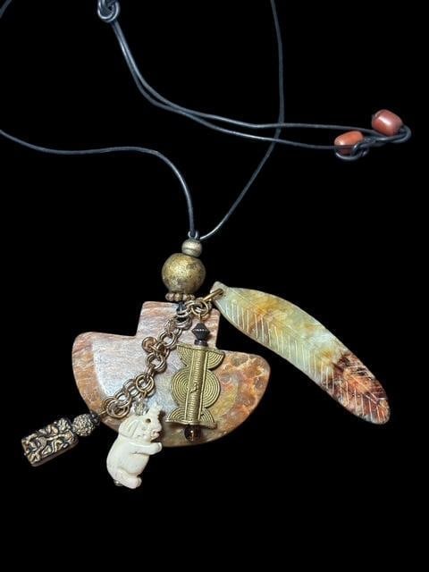 Carved Stone Feather and Carved Bone Elephant Pendant Necklace (1 of 3)