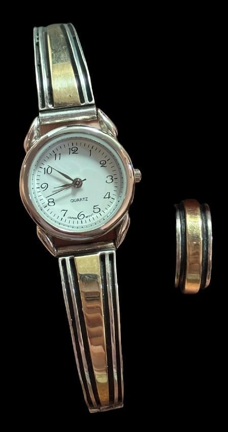 Navajo 14K Gold and Sterling Watch and Ring Set Signed Earl Plummer Dine: Ladies 14k gold and sterling silver watch and ring set. Circumference of watch closed is 7" with clasp open 9.5". Matching 14k gold and sterling ring size 6.25, ring weighs 6.7 grams. Watchband marked