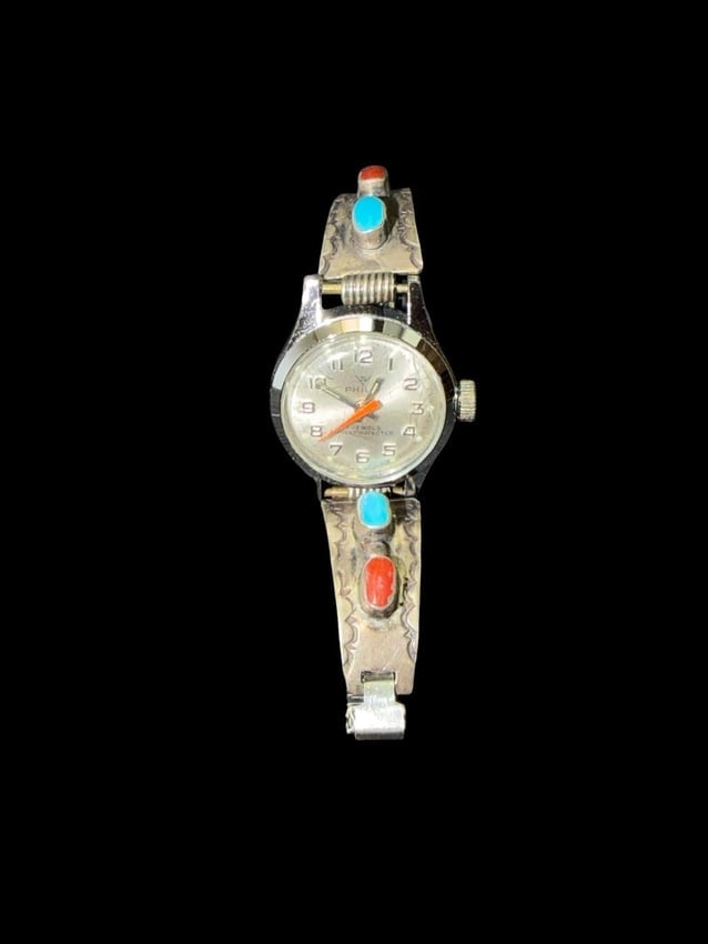 Ladies Philly Watch Face wtith Navajo Watch Band Sterling Turquoise Coral: Native American Navajo coral, turquoise and sterling ladies band on a Philly's watch face. 6" circumference unstretched.