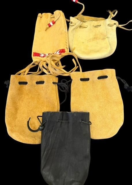 Lot of Five Native American Drawstring Top Pouches: Lot of five drawstring top pouches. Included is one by K.D. Fast Horse. Measures 4" x 9". Others measure 4"-6" x 5". See photos for details.