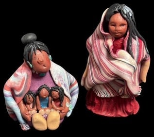 Pair of Polymer Clay Native American Figures: Pair of polymer clay Native American figures. Measures 2" x 1" and 1.5" x 1".