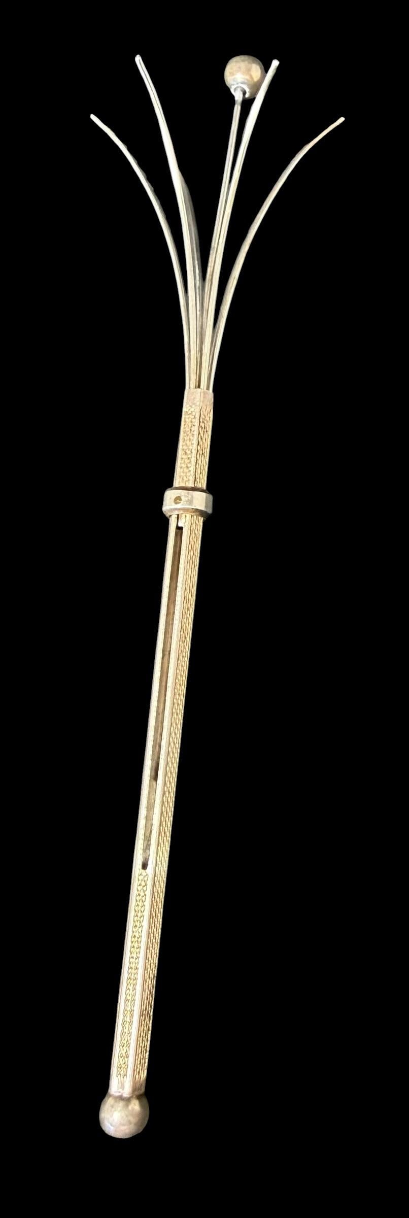 Art Deco Sterling Retractable Cocktail Swizzle Stick: Art deco sterling retractable cocktail swizzle stick. Marked sterling. Open measures 5", closed measures 3". Weighs 5g.