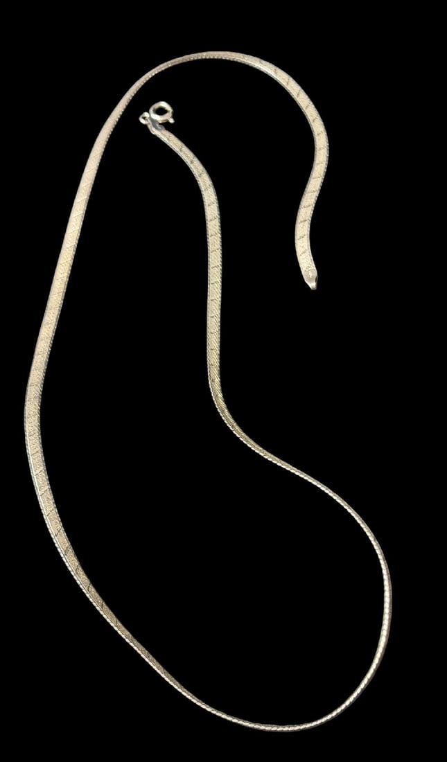 Italian Sterling Harringbone Necklace: Italian sterling chain. Marked .925 and Italy. Measures 13" and weighs 13g.