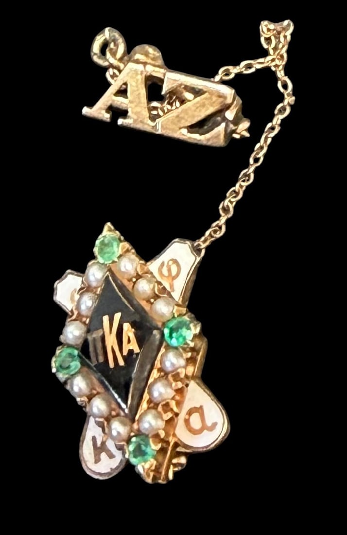 Antique Fraternity Pin with Emerald Chips and Seed Pearls: Antique signed fraternity pin with emerald chips and seed pearls. Tested 10K gold. KA on main pin and AZ on extension. Measures 3" x .75".