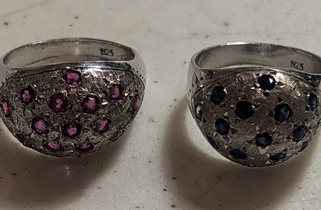 Lot of Two Sterling and Stone Rings: Lot of two sterling and stone rings. 1.) Red stone, size 7.5. 2) Green stone, size 7.5. Total weight 12g.