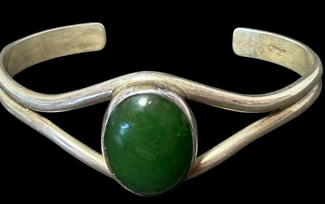 Native American Sterling and Jasper Stone Cuff Bracelet: Native American sterling and jasper stone cuff bracelet. Marked sterling. Measures 6" around with a 1" gap opening. Total weight 20g.