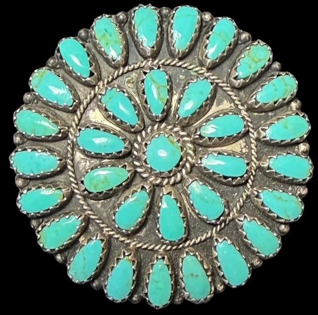 Native American Navajo Sterling and Turquoise Brooch/Pendant Victor Begay: Native American Navajo signed brooch/pendant with turquoise. Signed VJB (Victor Begay) and marked sterling. Measures 1.5" across and weighs 8g.