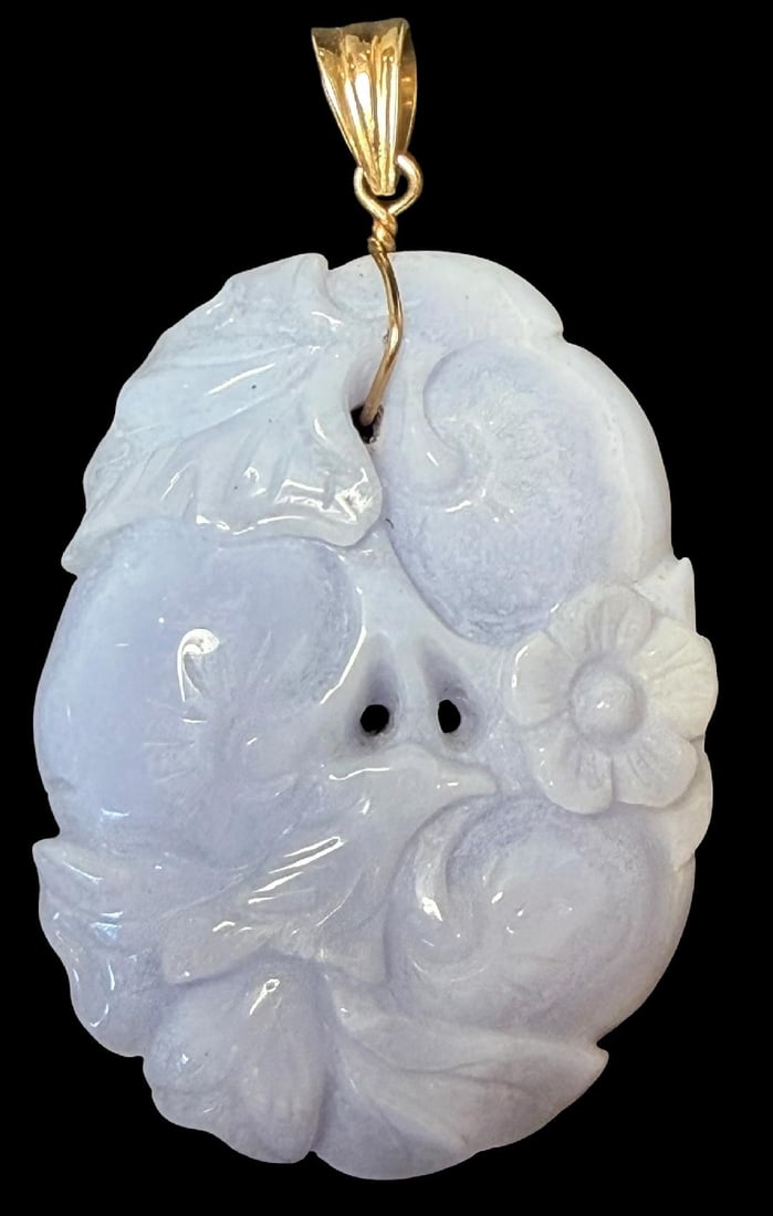 14K Gold and Lavender Jade Hand Carved Bird Pendant Gumps: 14K gold and lavender jade carved floral and bird pendant. Signed Gumps and marked 14k. Measures 1.5" x 2". Lovely piece.