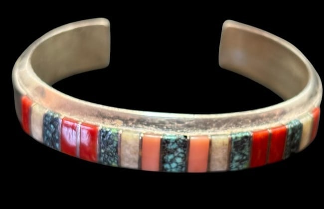 Vintage Zuni Signed Cuff Bracelet El Gasper: Vintage Zuni cuff bracelet with coral, spiny oyster and turquoise inlay. Marked sterling and signed El Gasper and Zuni. Measures 7" around with a 1" cuff opening.