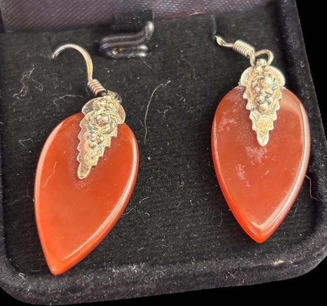 Sterling and Agate Stone Earrings: Sterling and cornelian brown agate earrings. Marked .925. Stones measures .5" x 1".