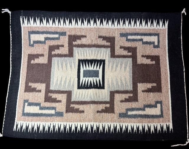 Navajo Gray Hills Rug with Spirit Line: Native American Navajo Gray Hills rug. Good tight weave, good colors and has spirit line. Measures 17.75" x 24.5".