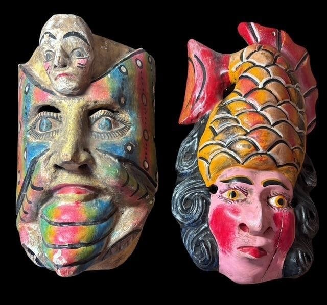Pair of Carved Mexican Wood Guerrero Dance Masks: Pair of Guerrero Dance Masks carved wood masks. Mexico. Nice carving detail and paint. Female mask measures 14" x 7.5". Male mask measures 12.5" x 7.5".