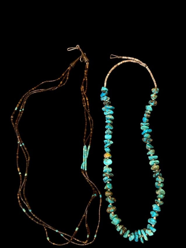 Pair of Native American Turquoise Necklaces: Pair of Native American turquoise necklaces. 1) Made of turquoise stones. Measures 23". 2) Shell and turquoise beads with silvertone end caps. Measures 25".