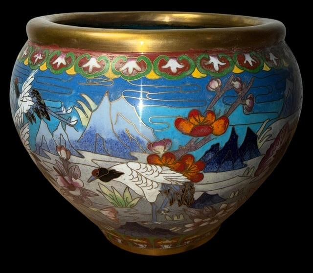 Chinese Cloisonne Vase: Chinese cloisonne vase. Ornate scenic design of storks, mountains and flowers. Measures 6.5" tall by 8" across at the widest point.