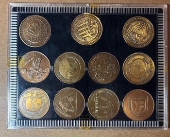 Set of Eleven Brass Apollo Tokens (1 of 4)