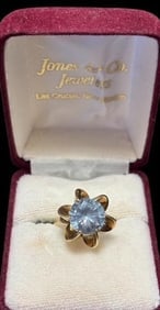 14K Gold and Blue Topaz Ring: 14k gold and blue topaz ring. Ring size 7.5 and weighs 5.1g.
