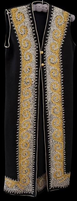 Moroccan Black Kaftan Robe: Moroccan black Kaftan robe with delicate and ornate hand stitched gold and silver thread design. No tags. Appears to be unworn. 51" long.